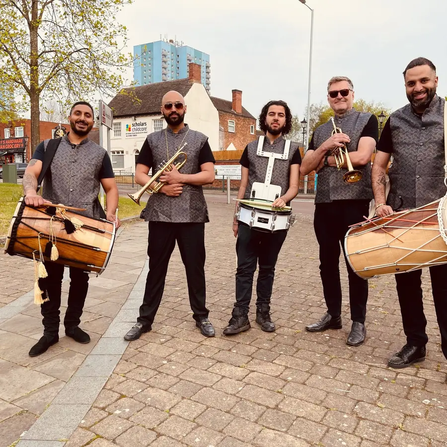 Five Beat Nation dhol and band baja players in matching outfits